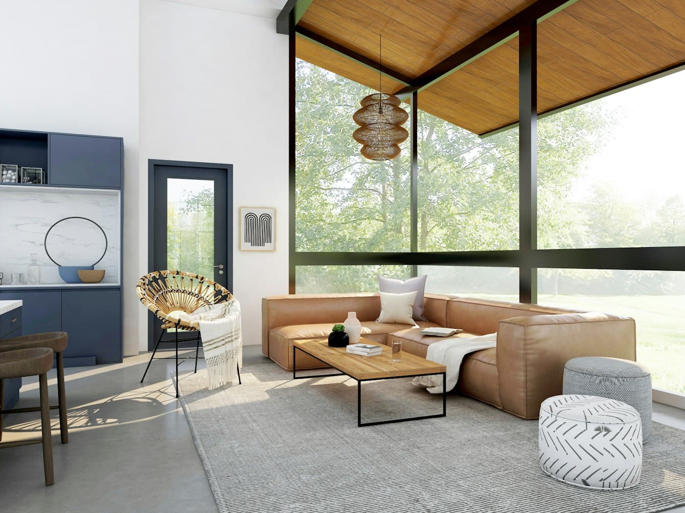 A sunroom with a leather sectional, tall windows, and a timber ceiling